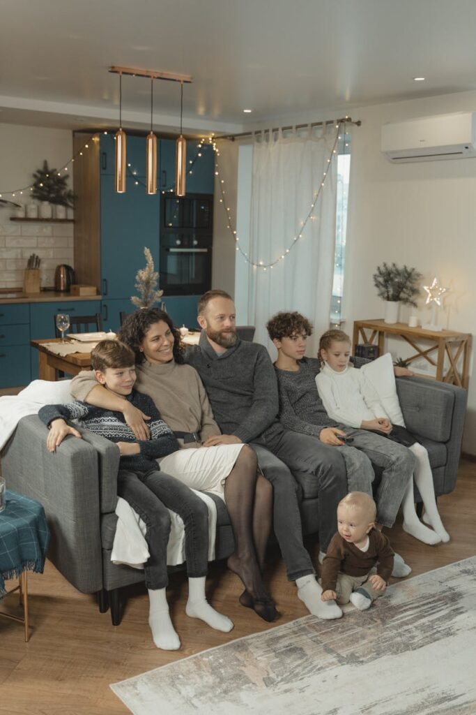 happy family sitting on a couch